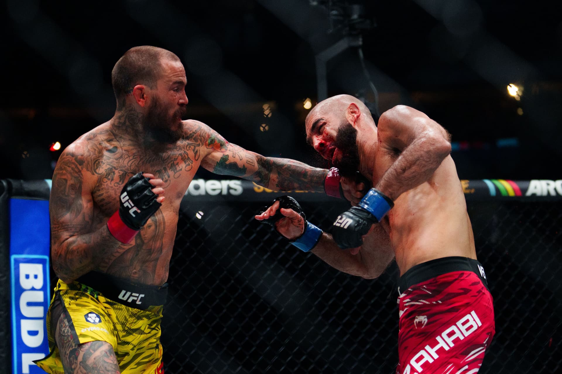 (L-R) Marlon Vera punches Aiemann Zahabi during the UFC Fight Night