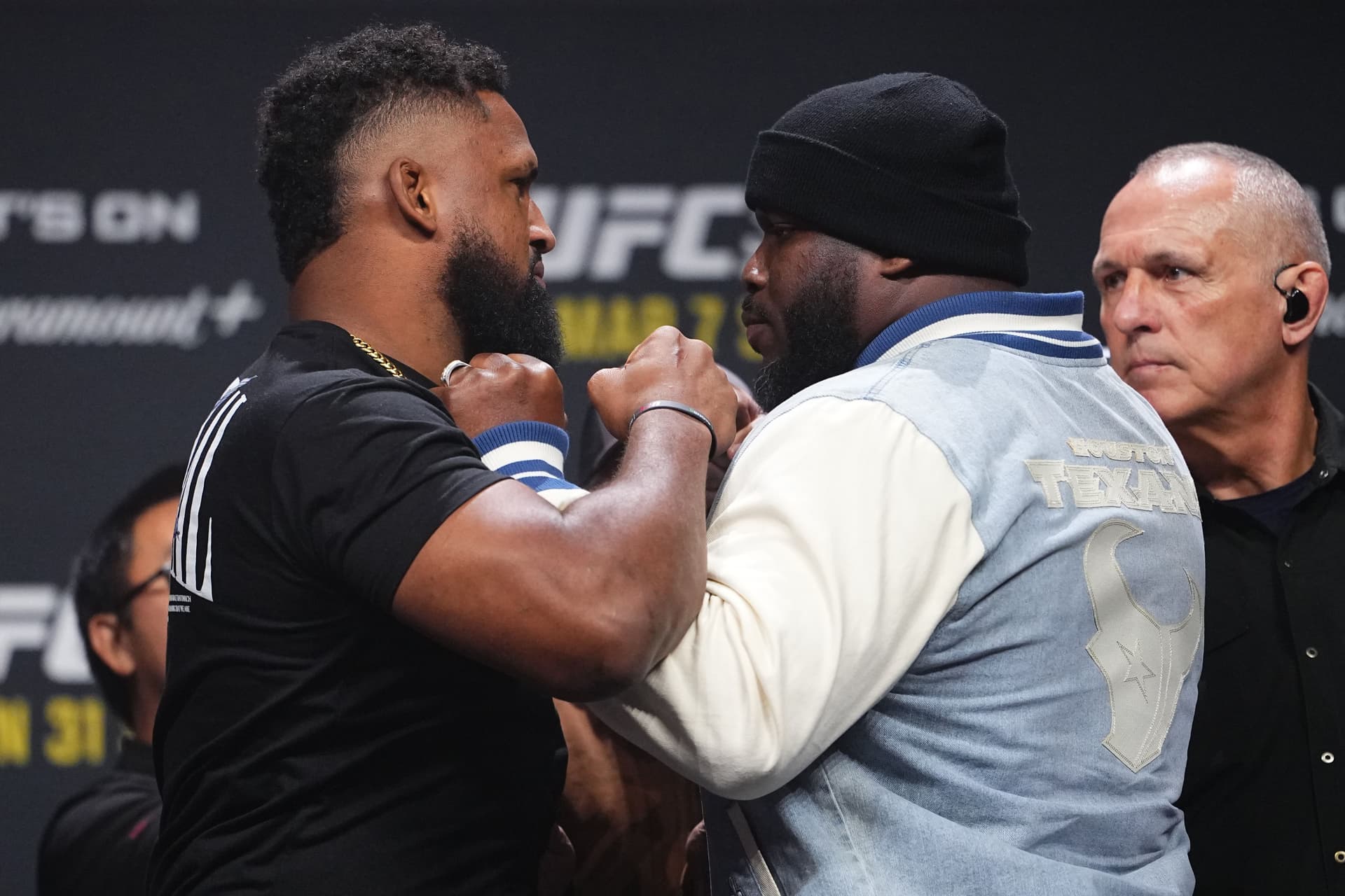 Opponents Waldo Cortes Acosta and Derrick Lewis