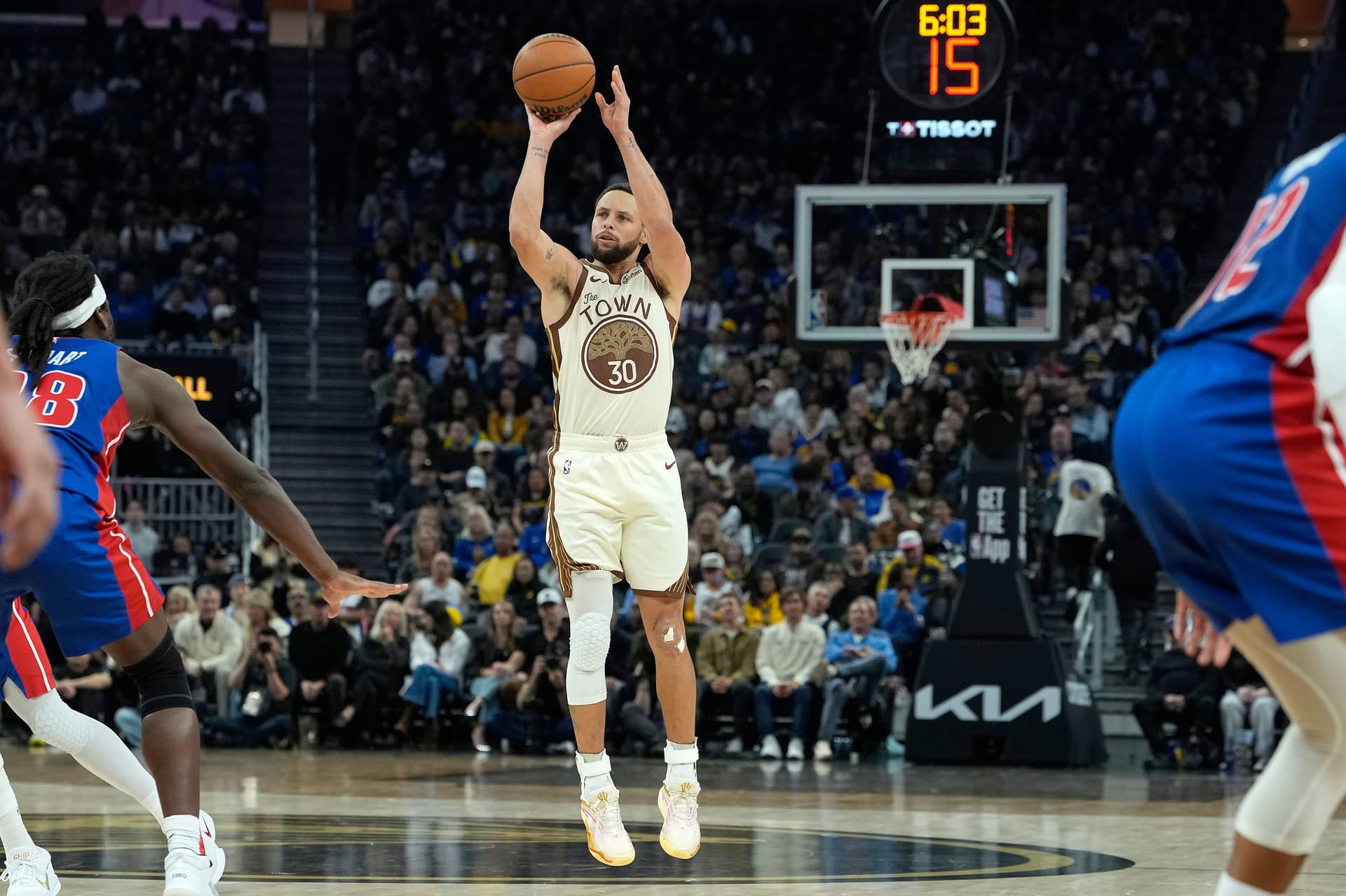 Stephen Curry #30 of the Golden State Warriors shoots a three-point shot