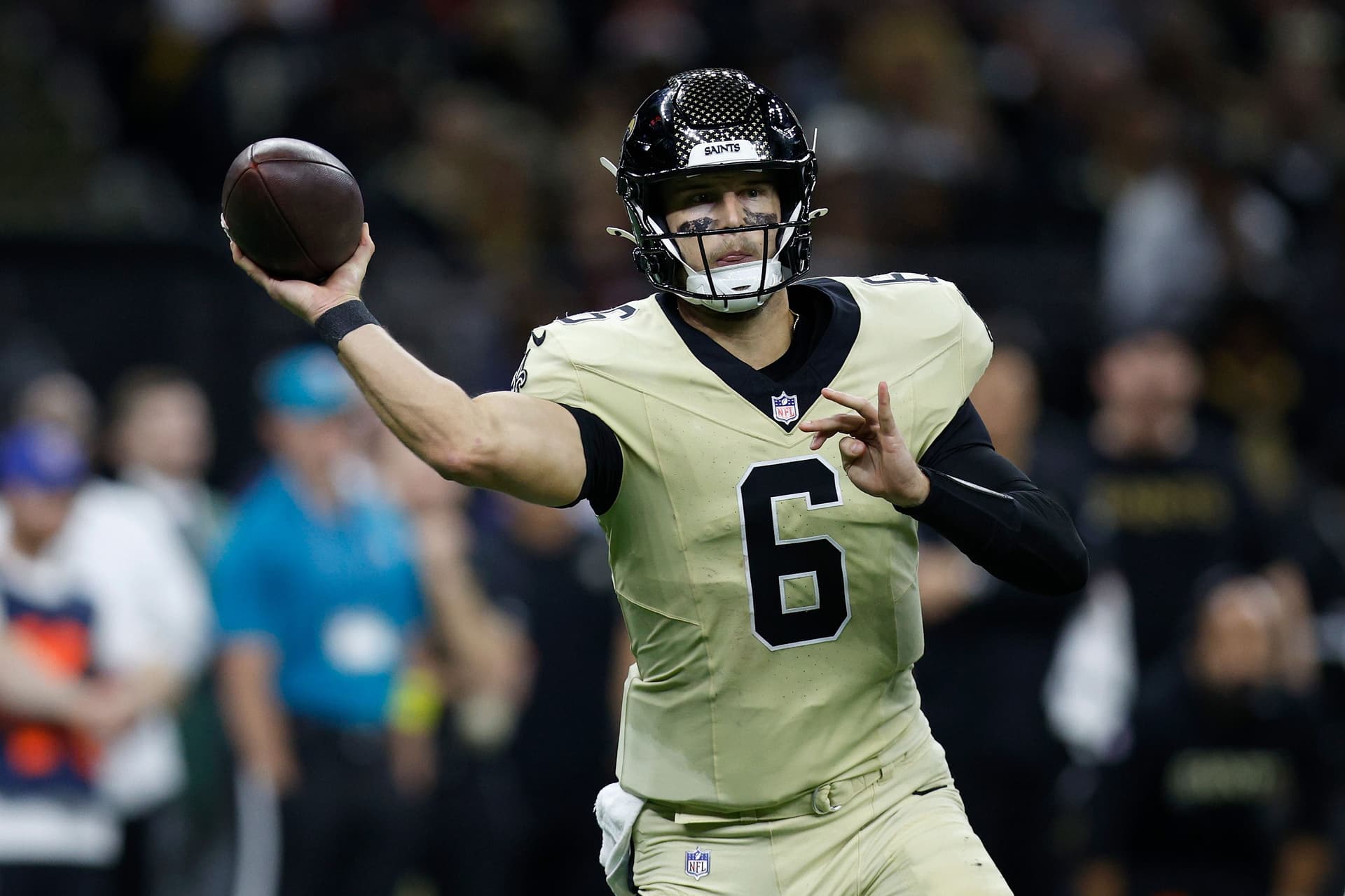 Tyler Shough #6 of the New Orleans Saints throws a pass