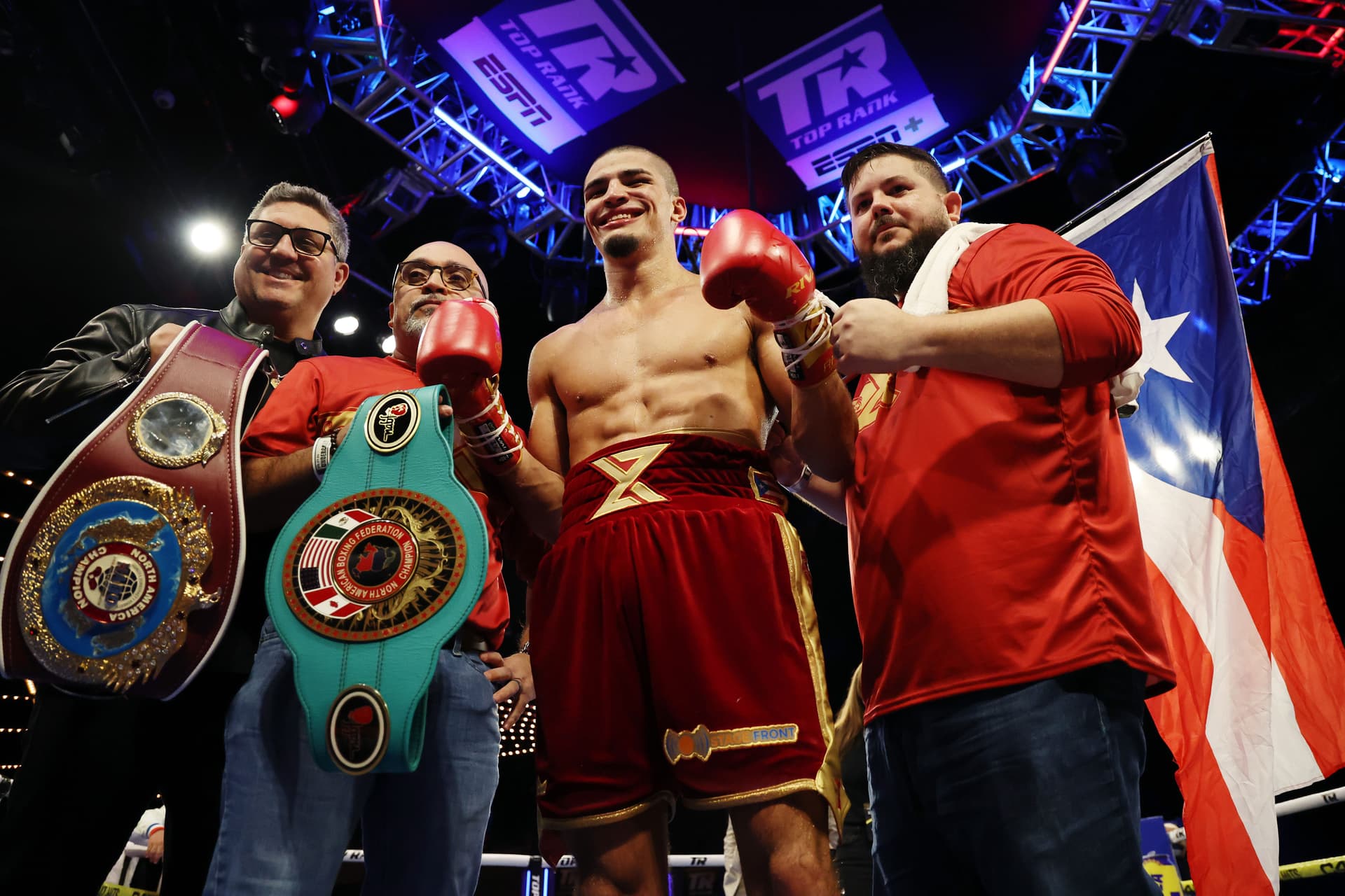 Xander Zayas of Puerto Rico reacts after defeating Damian Sosa